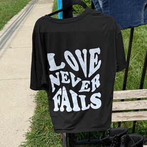 Reflective Graphic T-Shirt ‘Love Never Fails'